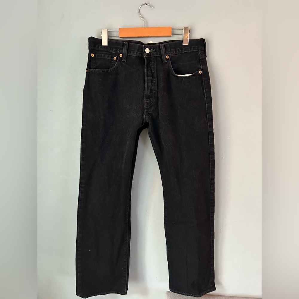 Levi’s mens 501 button fly black jeans. Size 33. Great condition!
